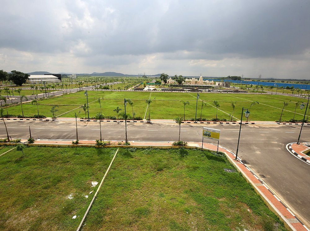 Landscaped residential plot layout with roads and lawns near Chennai